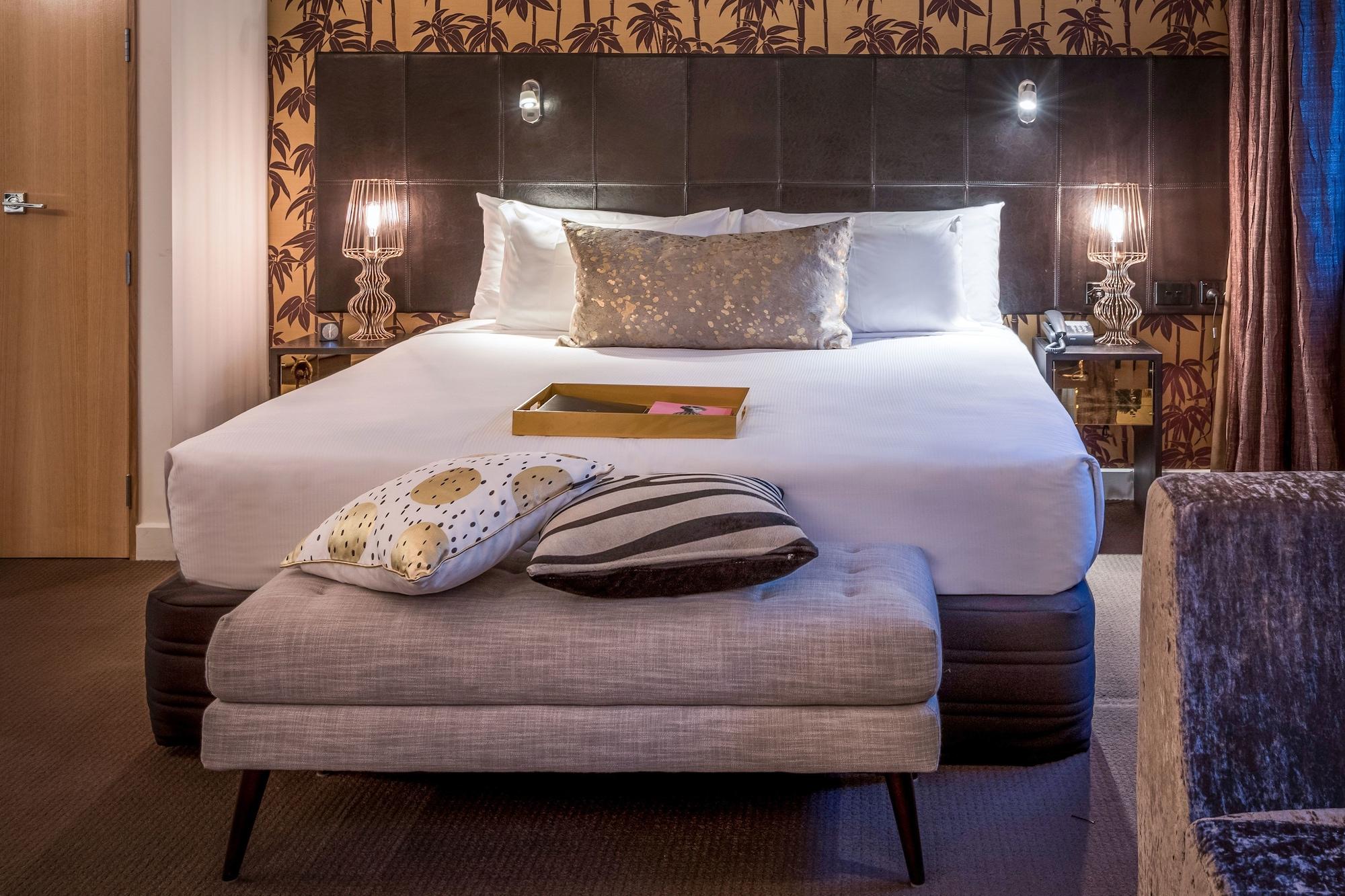 Qt 웰링턴 아파트먼트 외부 사진 A bedroom at the hotel